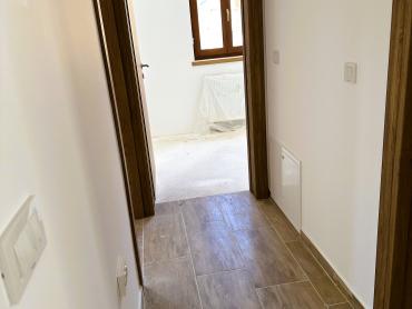 STAN NOVOGRADNJA- prizemlje od 55 m2 u užem centru Vžd.  Toplica