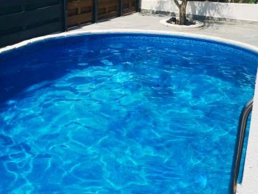ROVANJSKA  - DVOJNA KUĆA S DVA STANA I POGLEDOM NA MORE