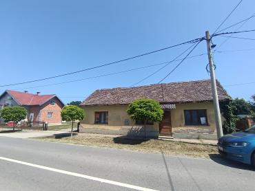 Kuća s potencijalom na glavnoj cesti u Topolju!